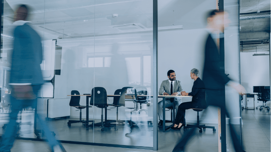 Investment Banking Professionals In A Modern Office Meeting Room Discussing Work